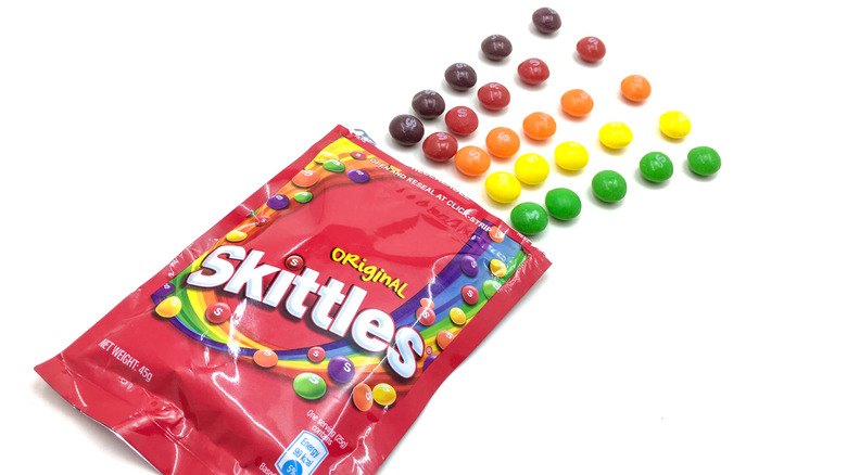 Skittles Original bag with rows of each color coming out