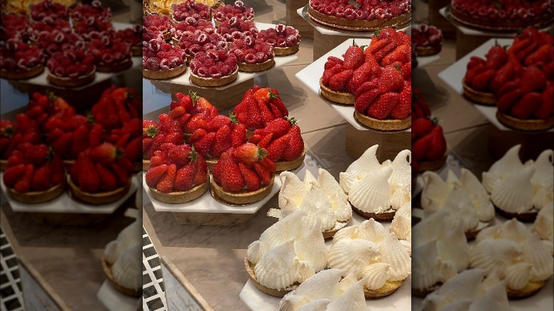 A variety of tarts on display at La Grande Épicerie in Paris, France