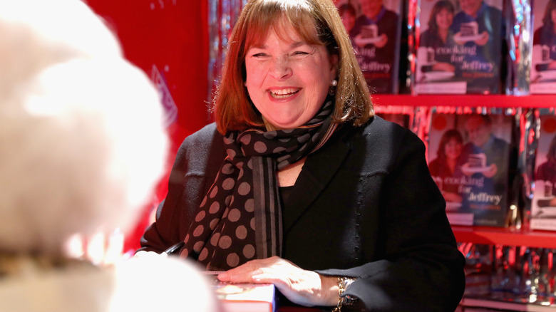 Ina Garten signs book for a fan