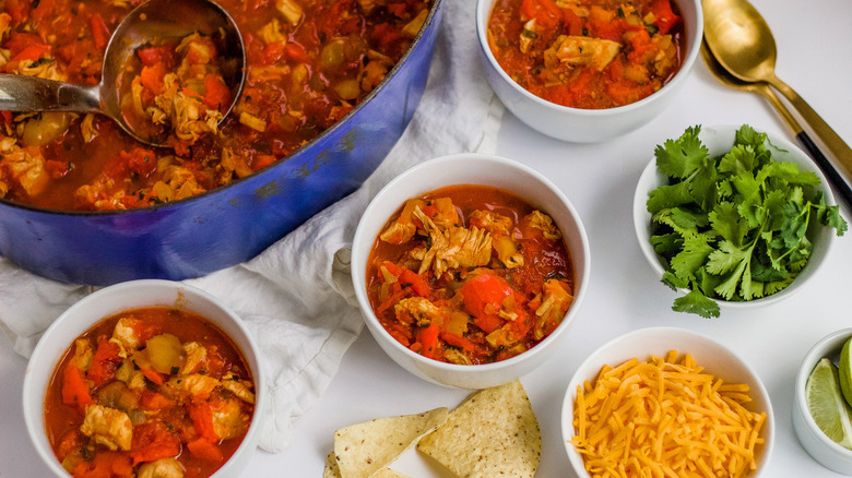 Chicken chili with peppers in blue pot