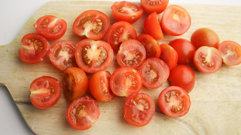 tomatoes on a cutting board 