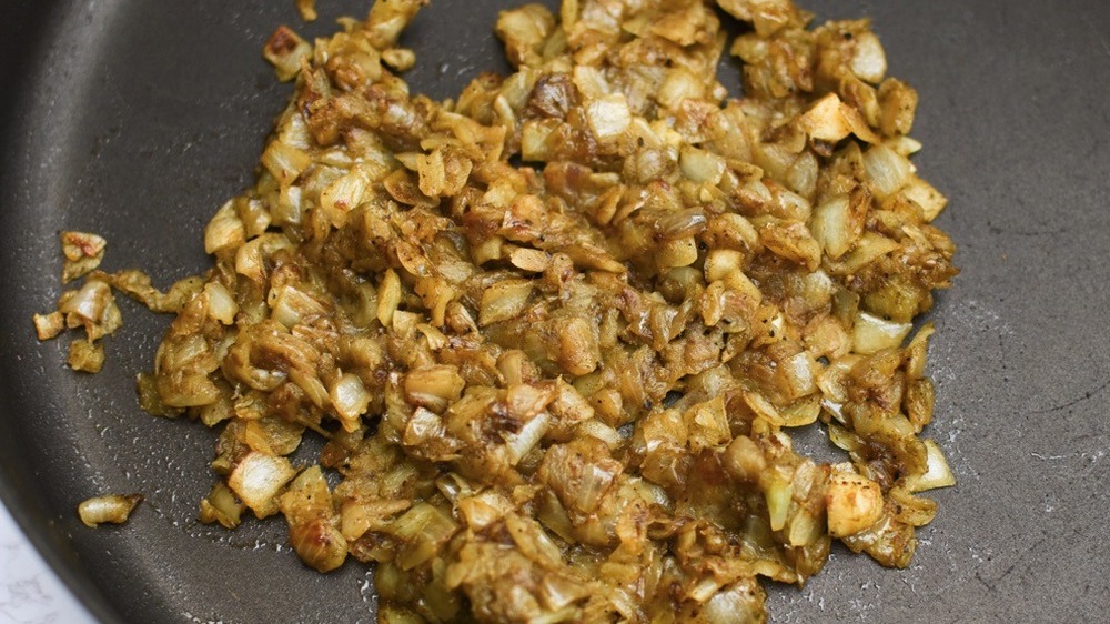 onions cooking in skillet