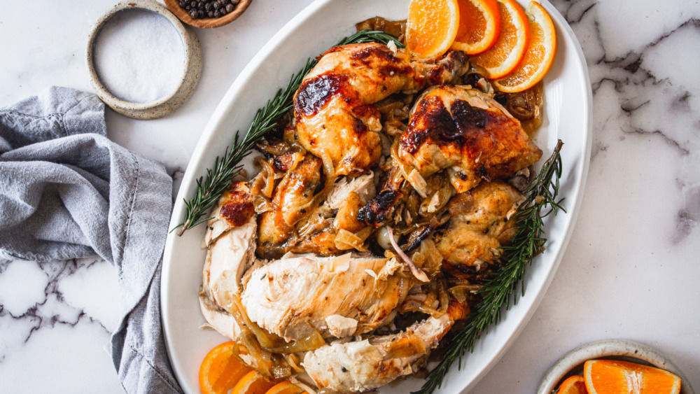 carved roast chicken on platter