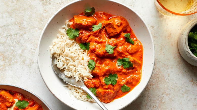 Bowl of chicken tikka masala and rice