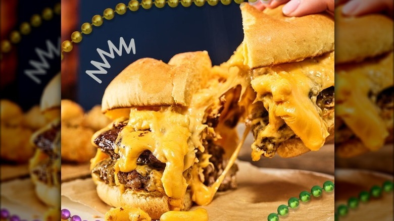 double cheeseburger with cheese oozing out