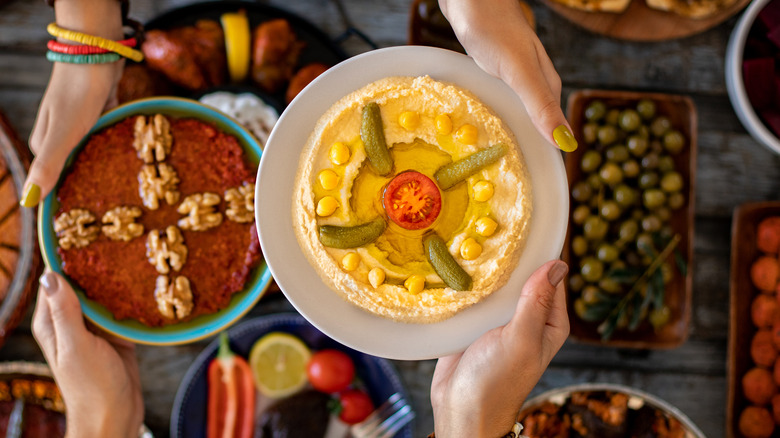 hummus topped with pickles