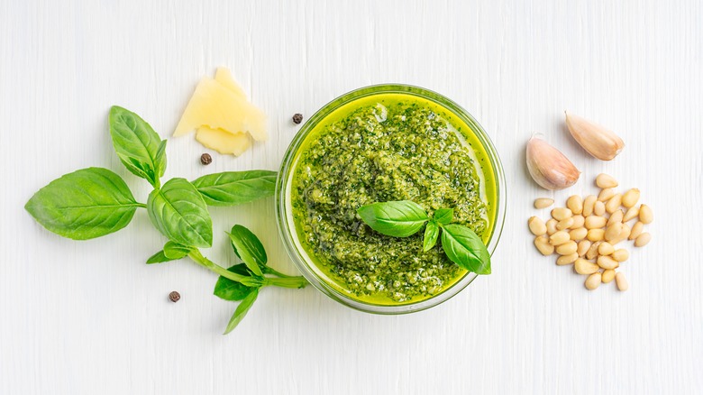 bowl of pesto with ingredients