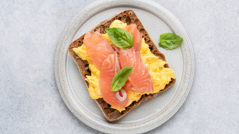 Scrambled eggs with salmon on toast