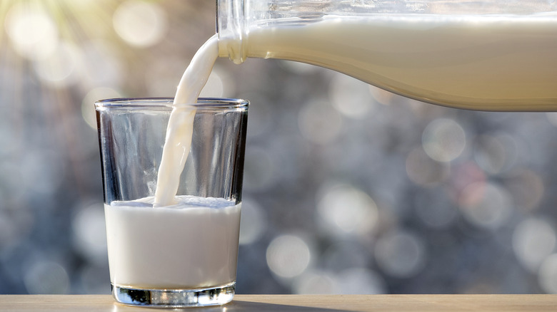 pouring milk into glass