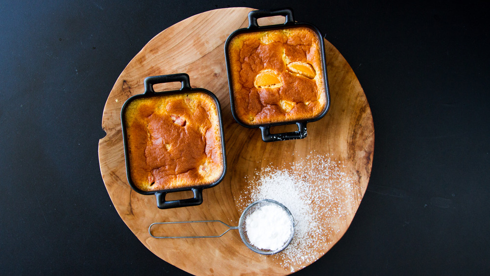 Malva pudding and powdered sugar dessert