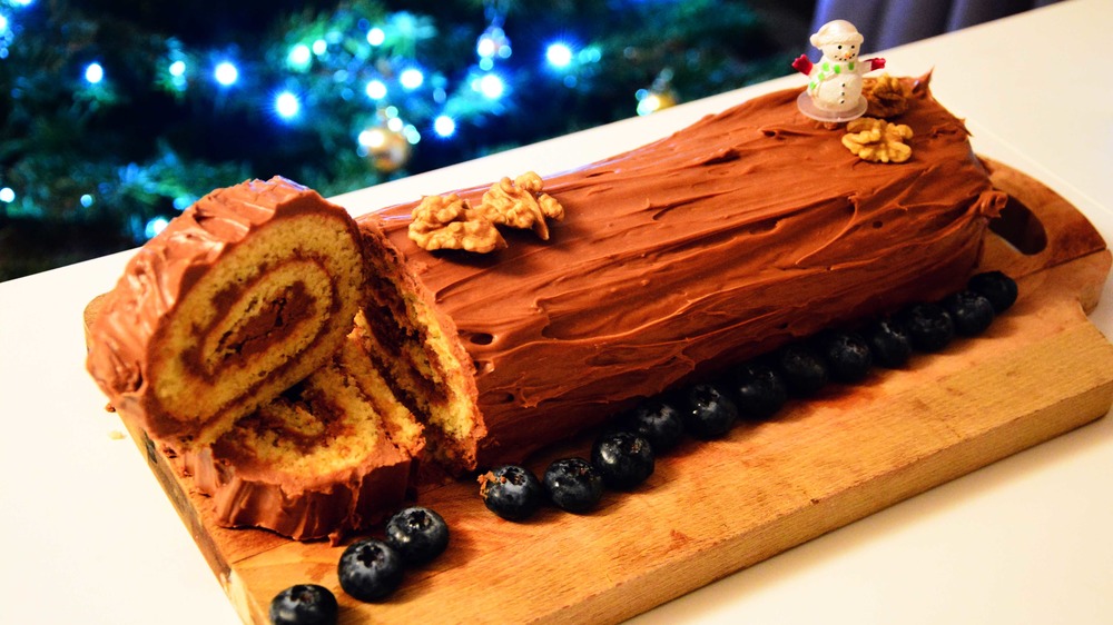 A French homemade Yule log cake (Bûche de Noël) dessert