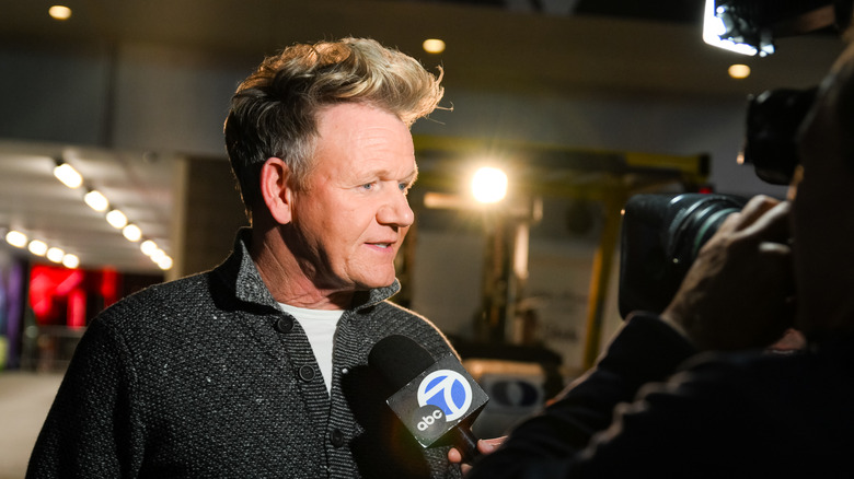 Gordon Ramsay speaking to reporters 