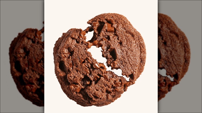 very chocolatey cookie broken in half