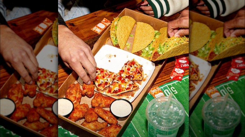 Taco Bell's new Ultimate Gameday Box featuring crunchy tacos, a Mexican Pizza, and Crispy Chicken Wings