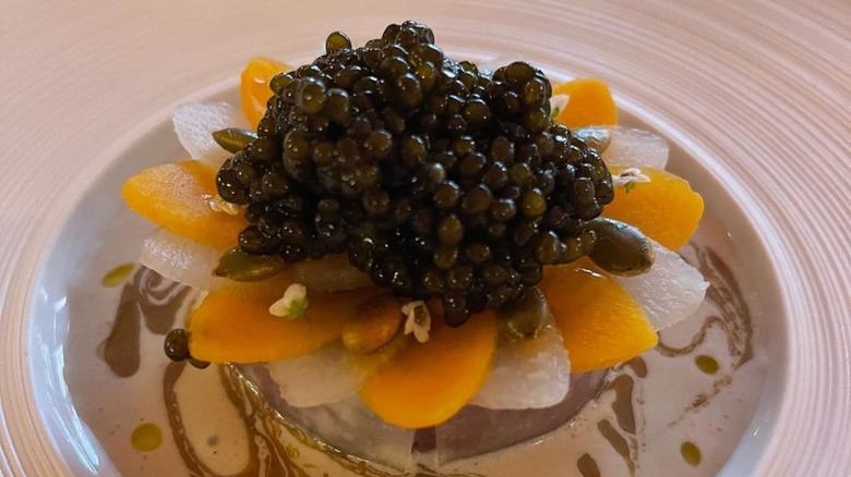 Fruit and caviar dish