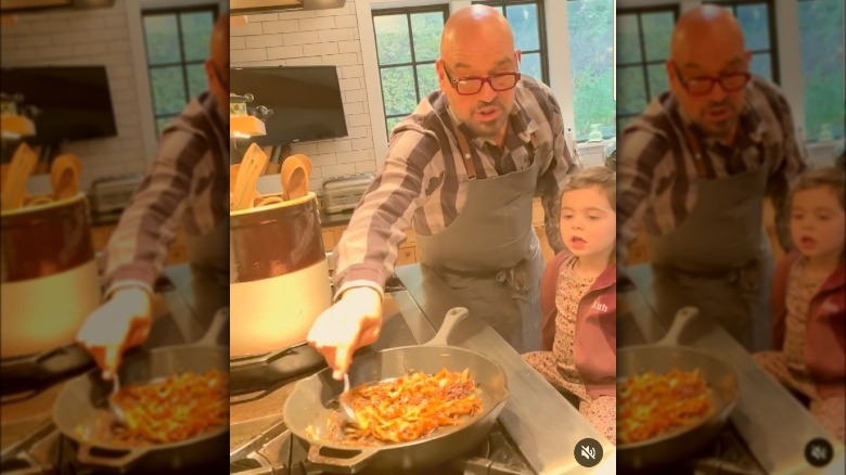 Michael Symon cooking with granddaughter