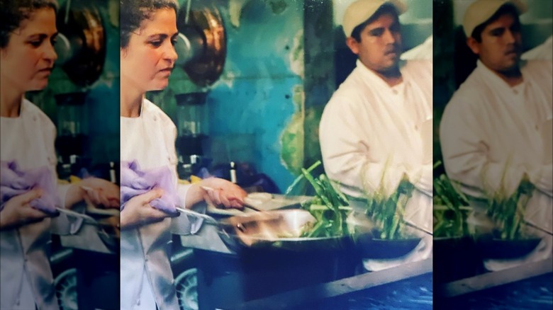 Alex Guarnaschelli in a white coat