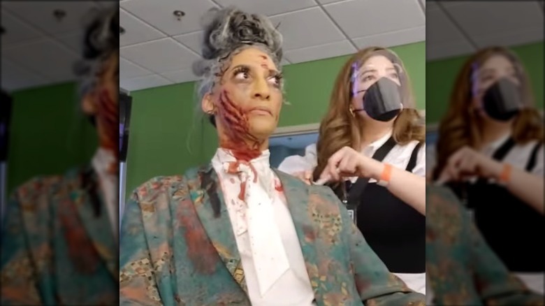 Carla Hall in creepy makeup for Halloween Baking Championship