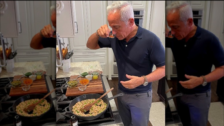 geoffrey zakarian cooking beans in a pan