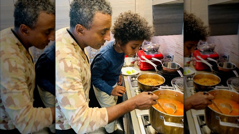 Marcus Samuelsson cooking soup with son