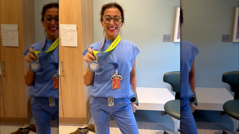 Marathon runner doctor in blue scrubs