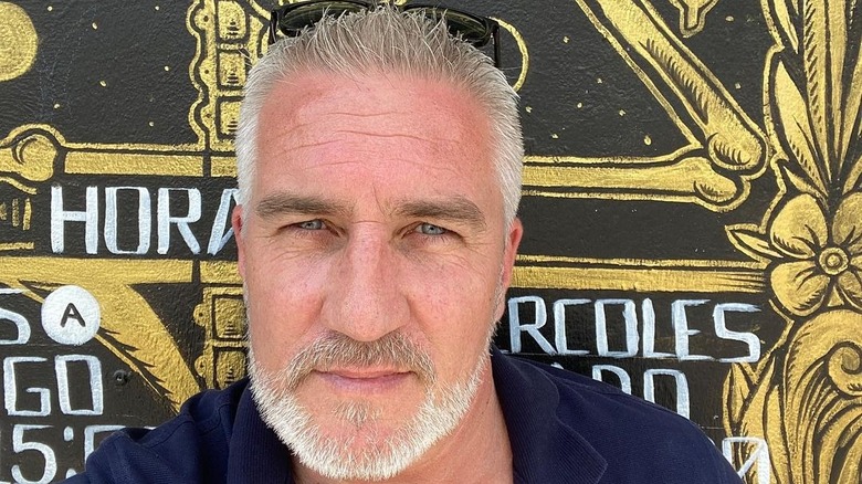 Paul Hollywood in a dark blue shirt