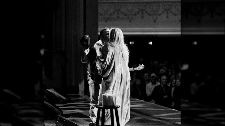 Trisha Yearwood kisses Garth Brooks