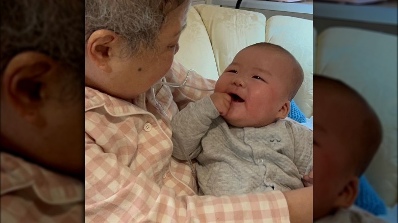 David Chang's mom with baby Gus