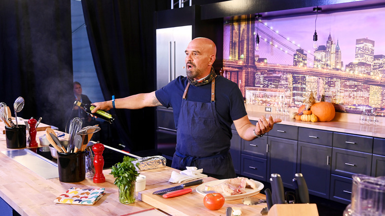 Michael Symon cooking on set