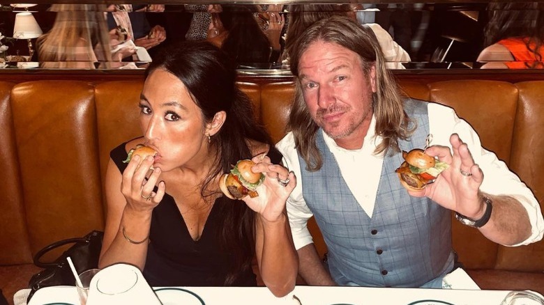 Chip and Joanna Gaines eating sliders