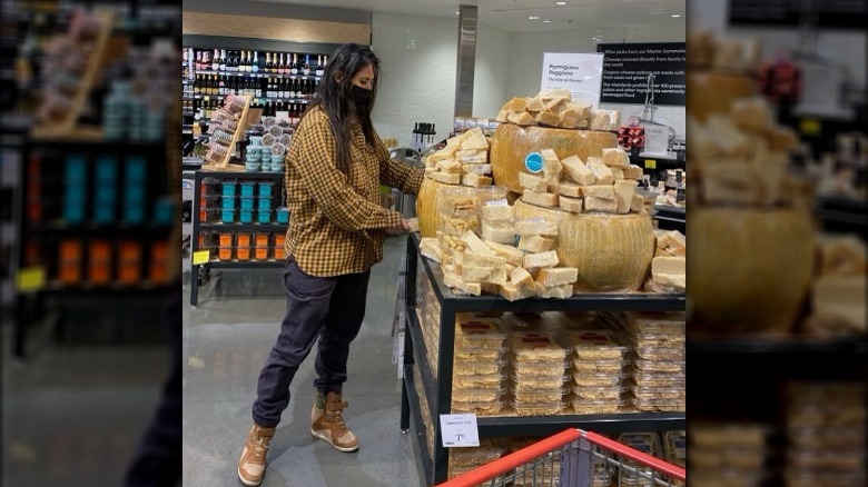 Olivia Munn shopping for cheese