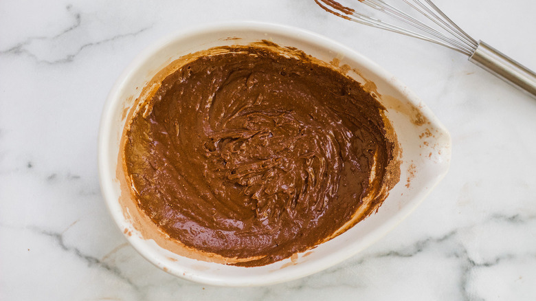 Brownie batter sitting in a bowl