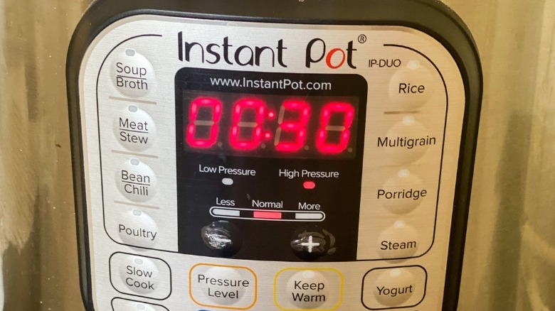 Instant Pot screen set at 30 minutes of pressure cooking