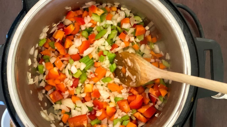 carrot, celery, onion, garlic, and bell pepper sauteeing in Instant Pot