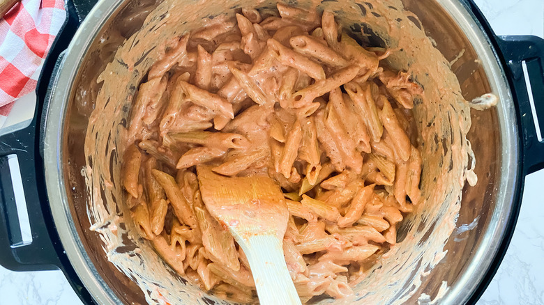 creamy penne pasta in pot