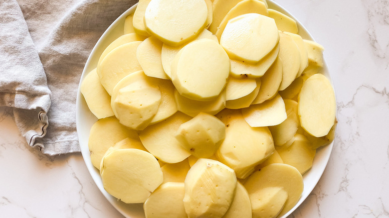 sliced potatoes on a plate