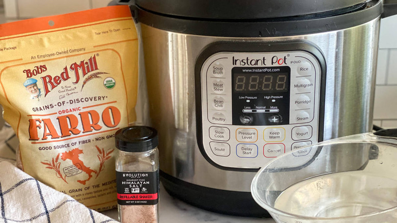 Bag of farro and Instant Pot on a countertop