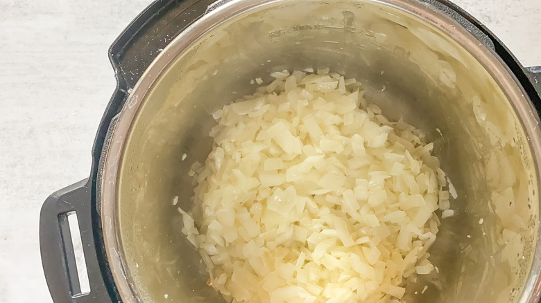 translucent onions in pot