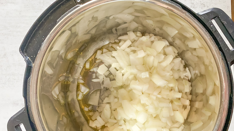 Instant pot with chopped onion