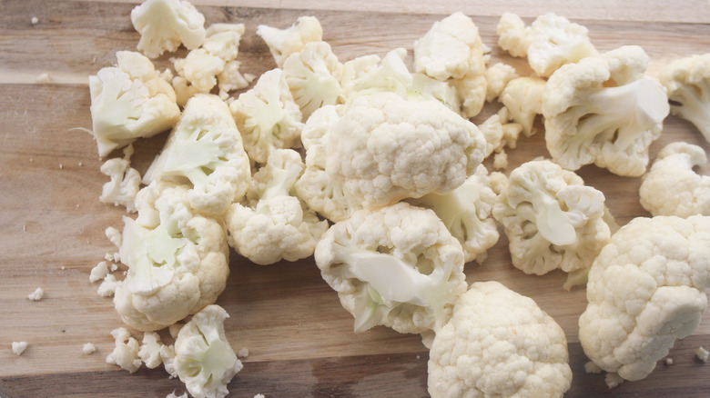 chopped cauliflower on cutting board