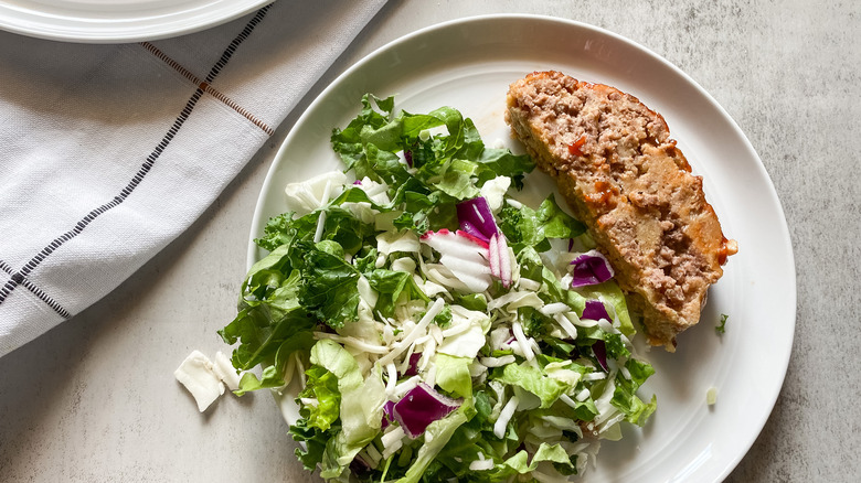 meatloaf on plate with salad