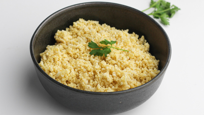 millet in black bowl