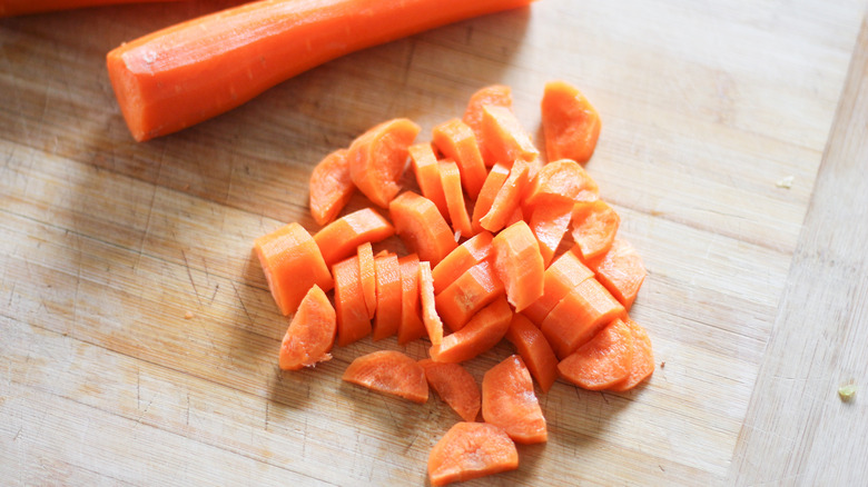 chopped carrots on cutting board 