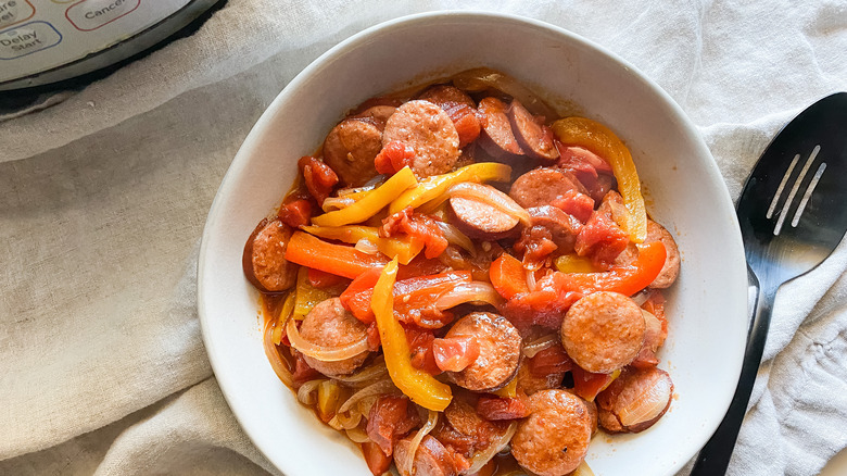 A bowl of sausage and peppers