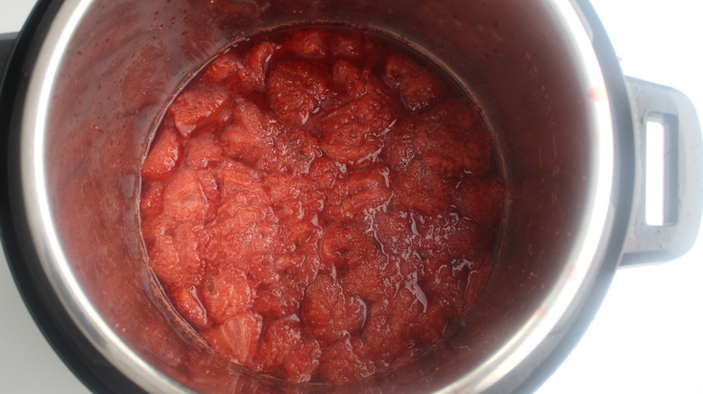 Stewed strawberries in the cooker pot