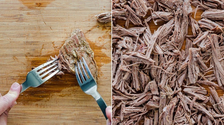 Shredding flank steak with forks for vaca frita