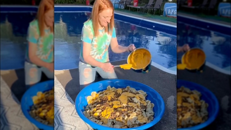 woman making nachos in kiddie pool