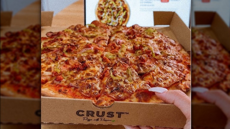 A box of Crust Pizza