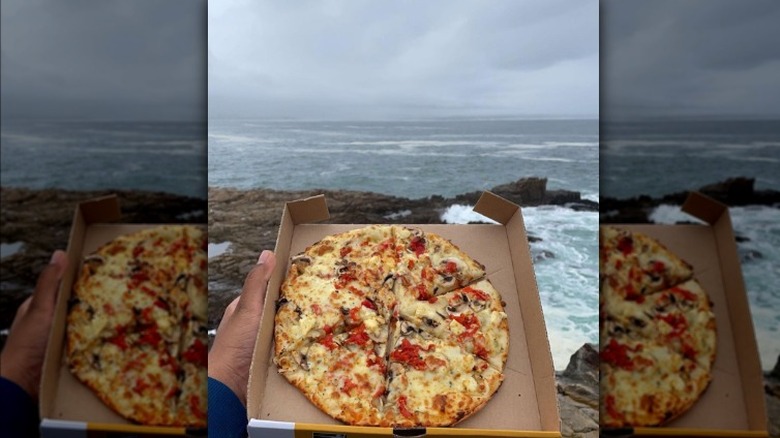 A seaside Debonairs pizza