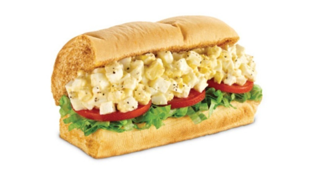 Small sub sandwich with egg salad and veggies